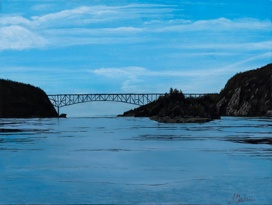 Bridge over a calm body of water with rocky cliffs on either side. Landscape depicting a different vantage viewpoint of Deception Pass, connection Whidbey Island to the mainland of Skagit County, WA.